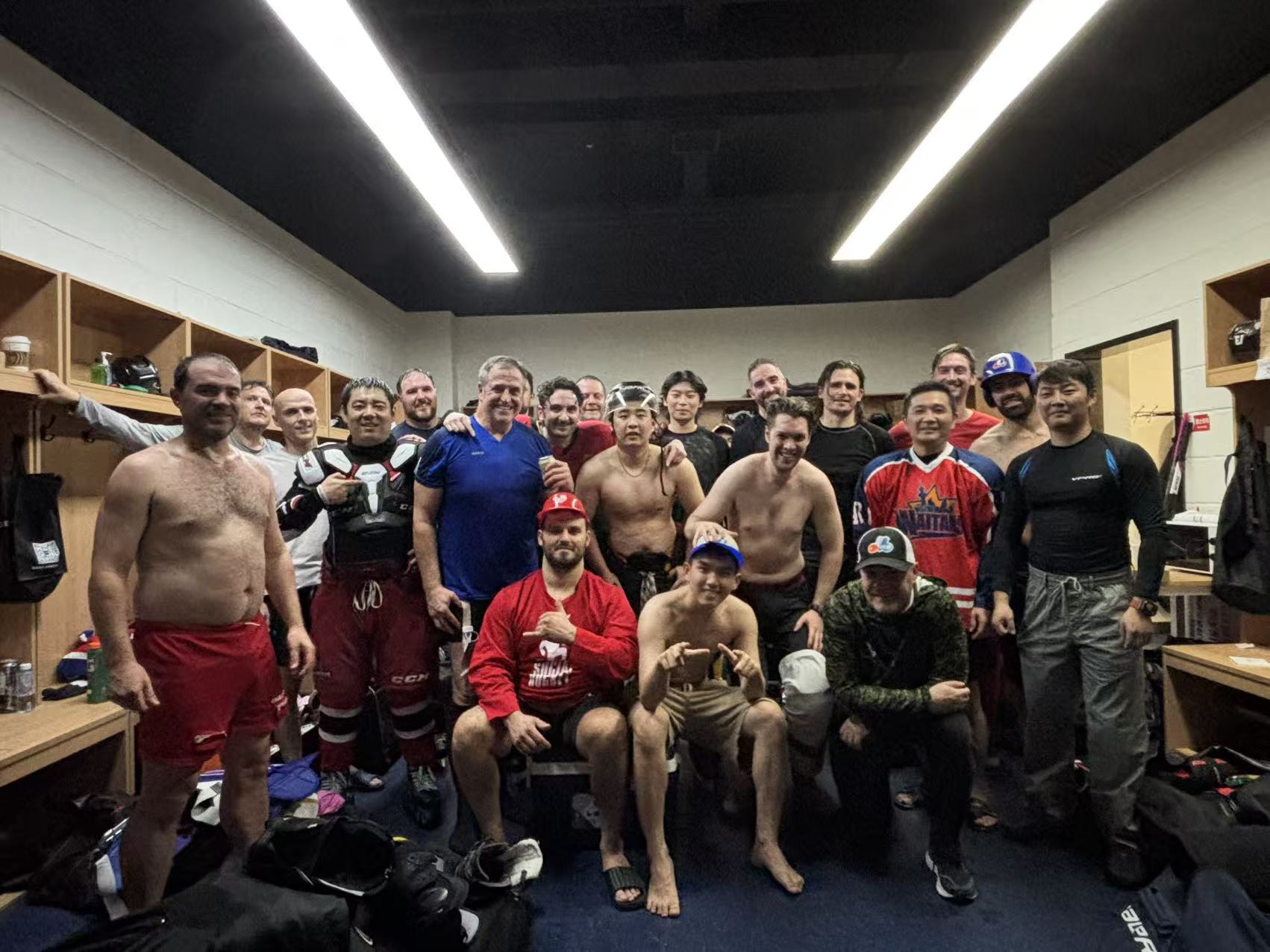 Hot Wings and Expos Week 3 locker-room team photo