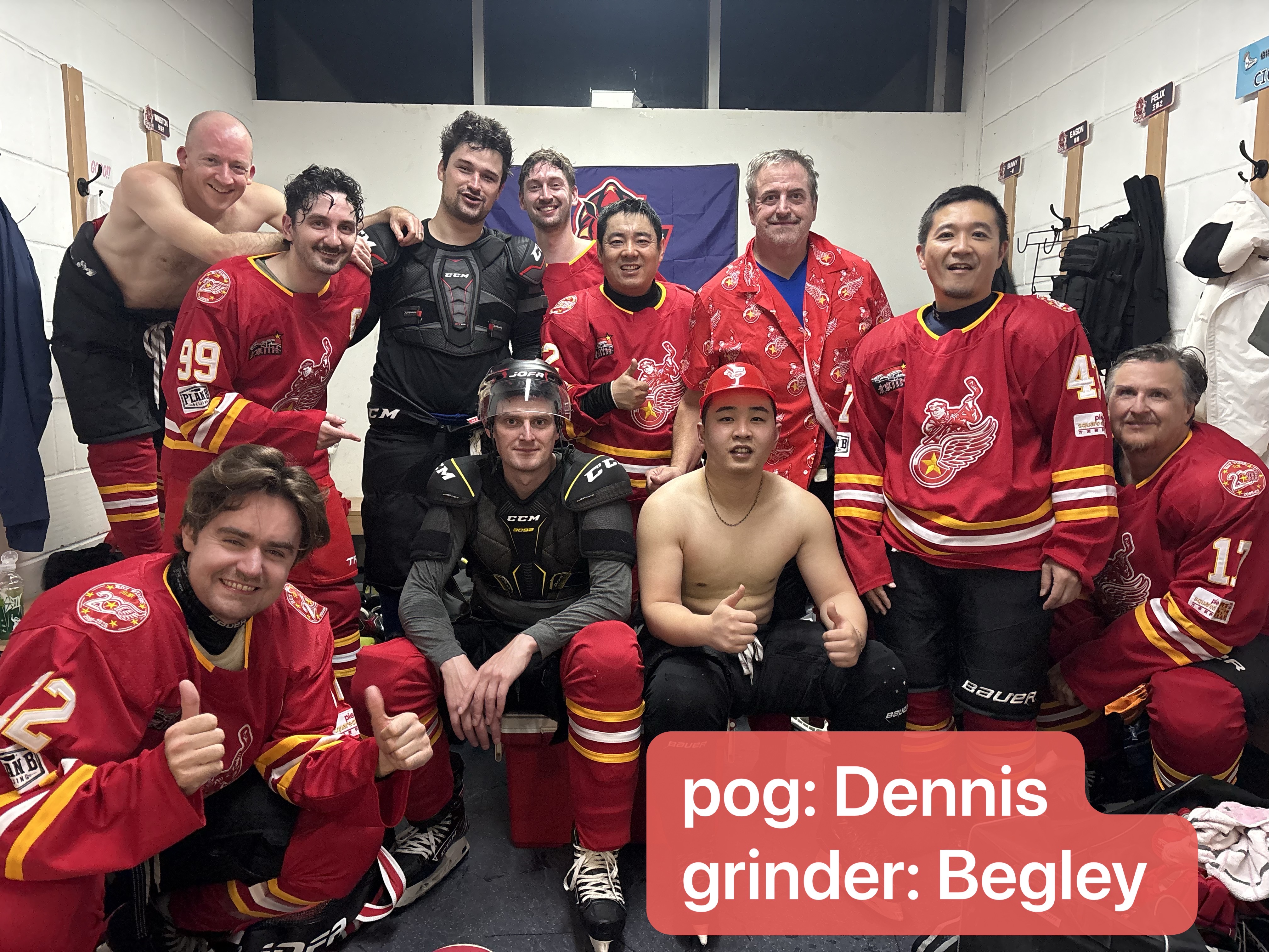 Hot Wings Week 5 locker-room team photo celebrating player of the game Dennis and grinder Begley