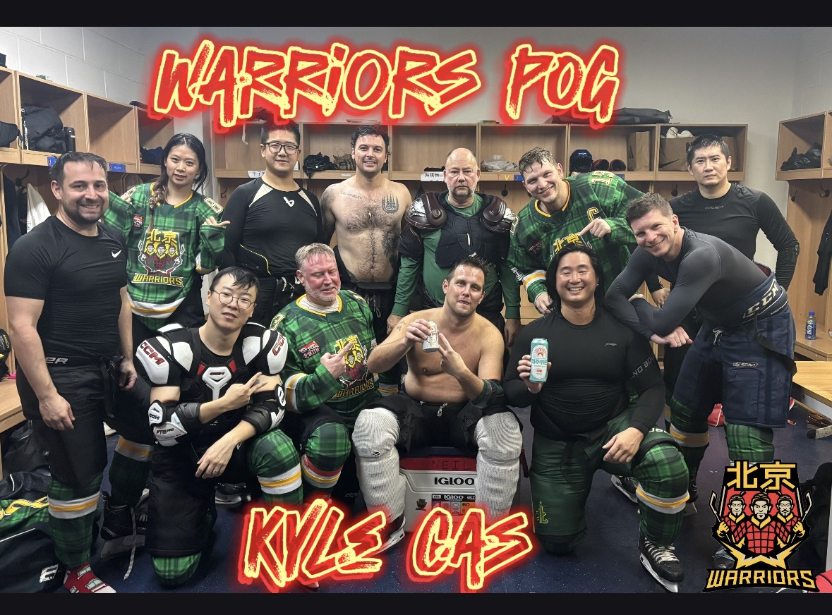 Warriors Week 5 locker-room team photo celebrating player of the game Kyle Cas